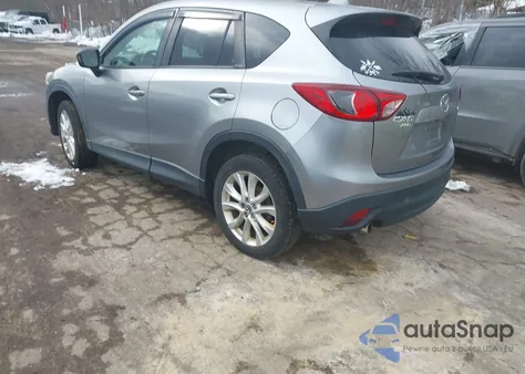2013 Mazda Cx-5 Grand Touring z USA, uszkodzony, nr VIN JM3KE4DE7D0105302